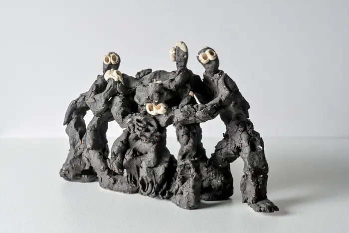 Schwarze Figurengruppe